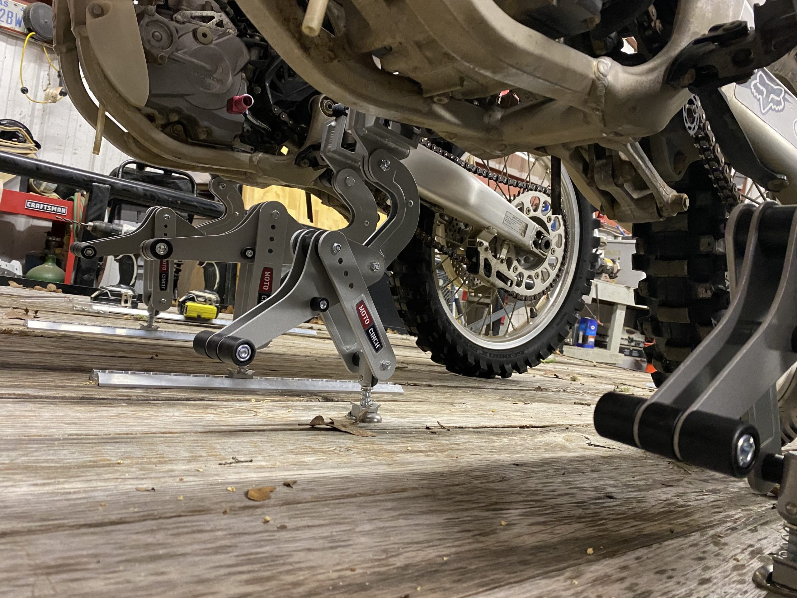 Moto Cinch Strapless tie down transport system