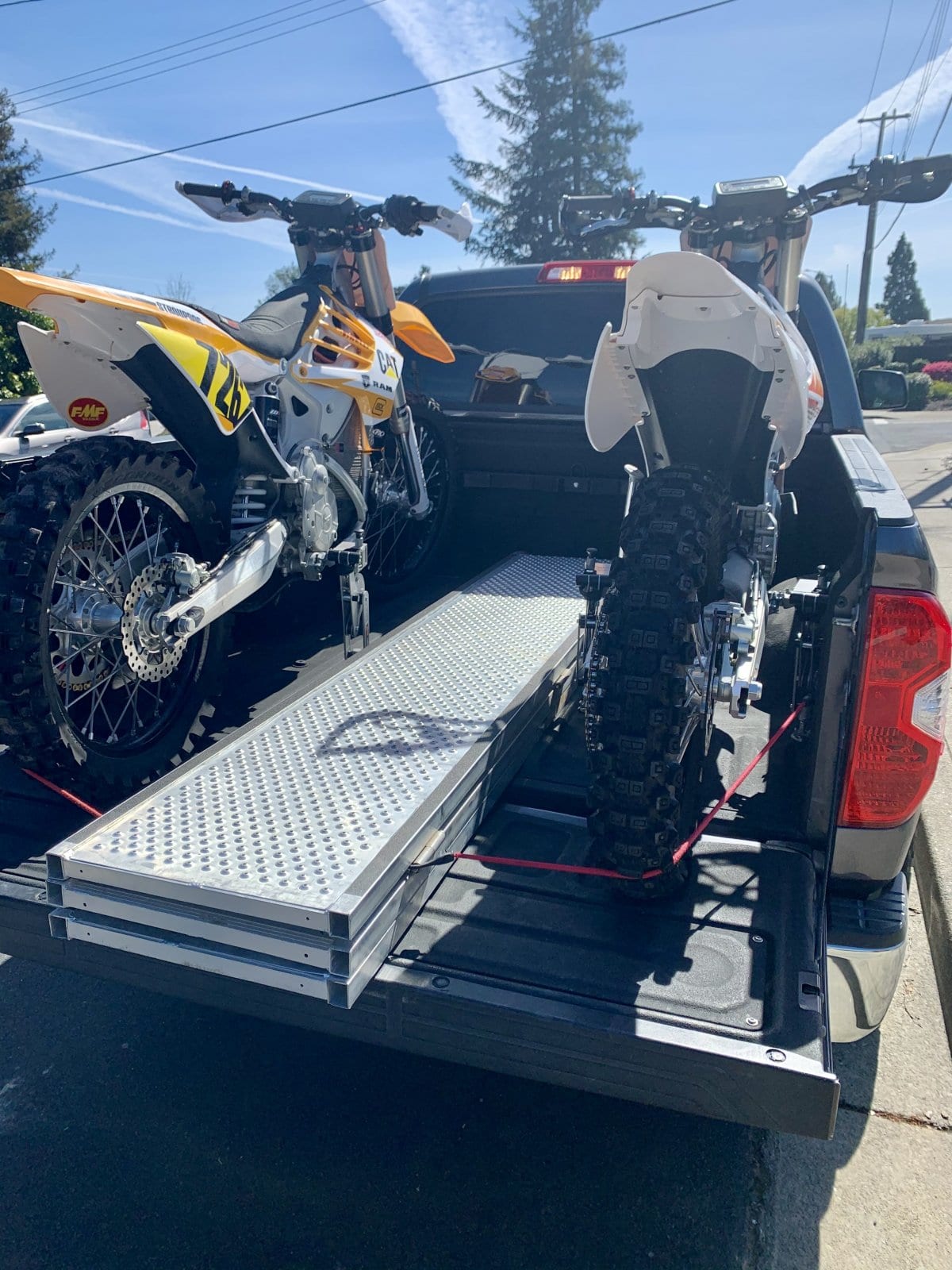 Alta motorcycle using moto cinch tie downs