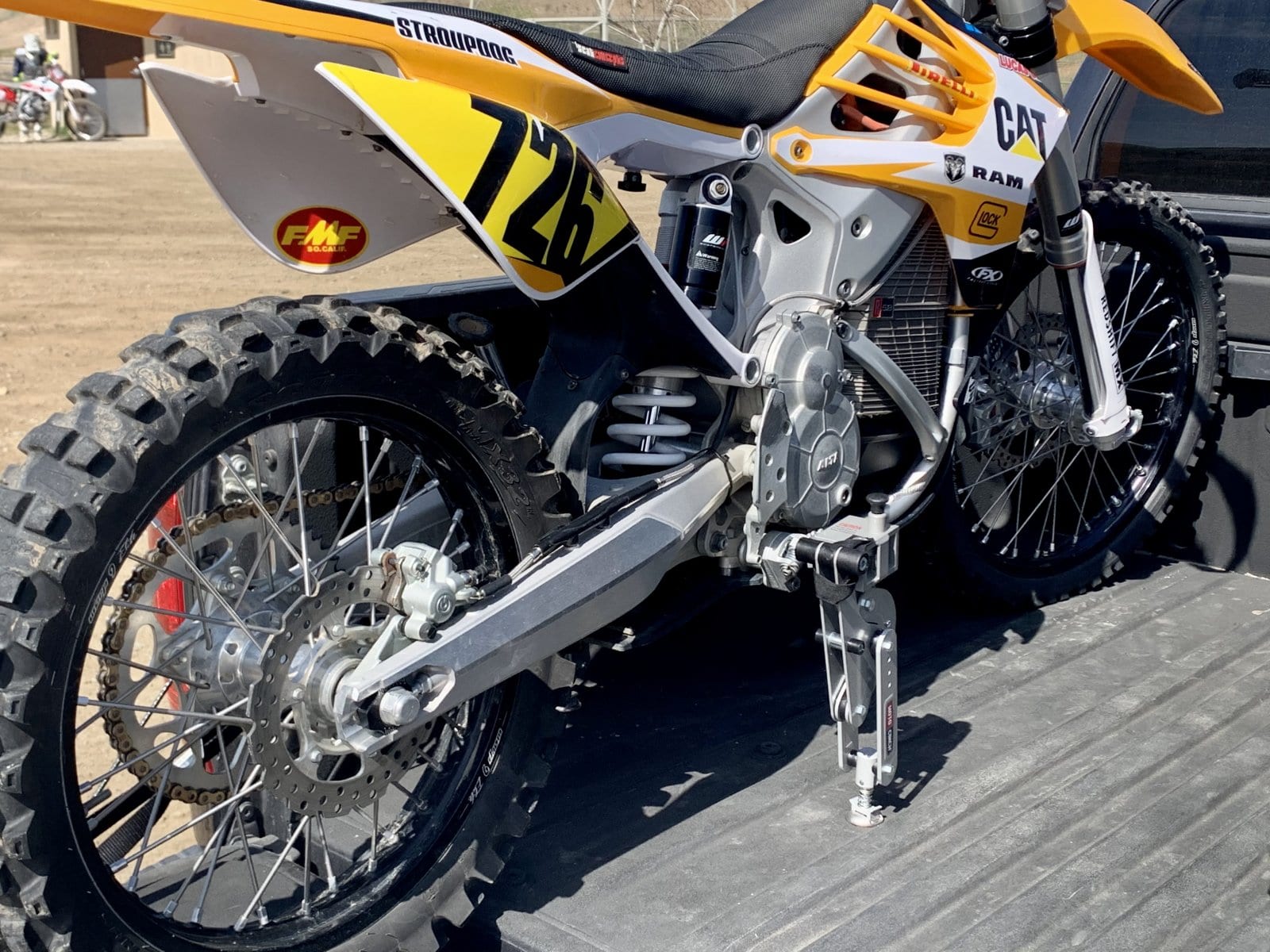 Alta motorcycle using moto cinch tie downs