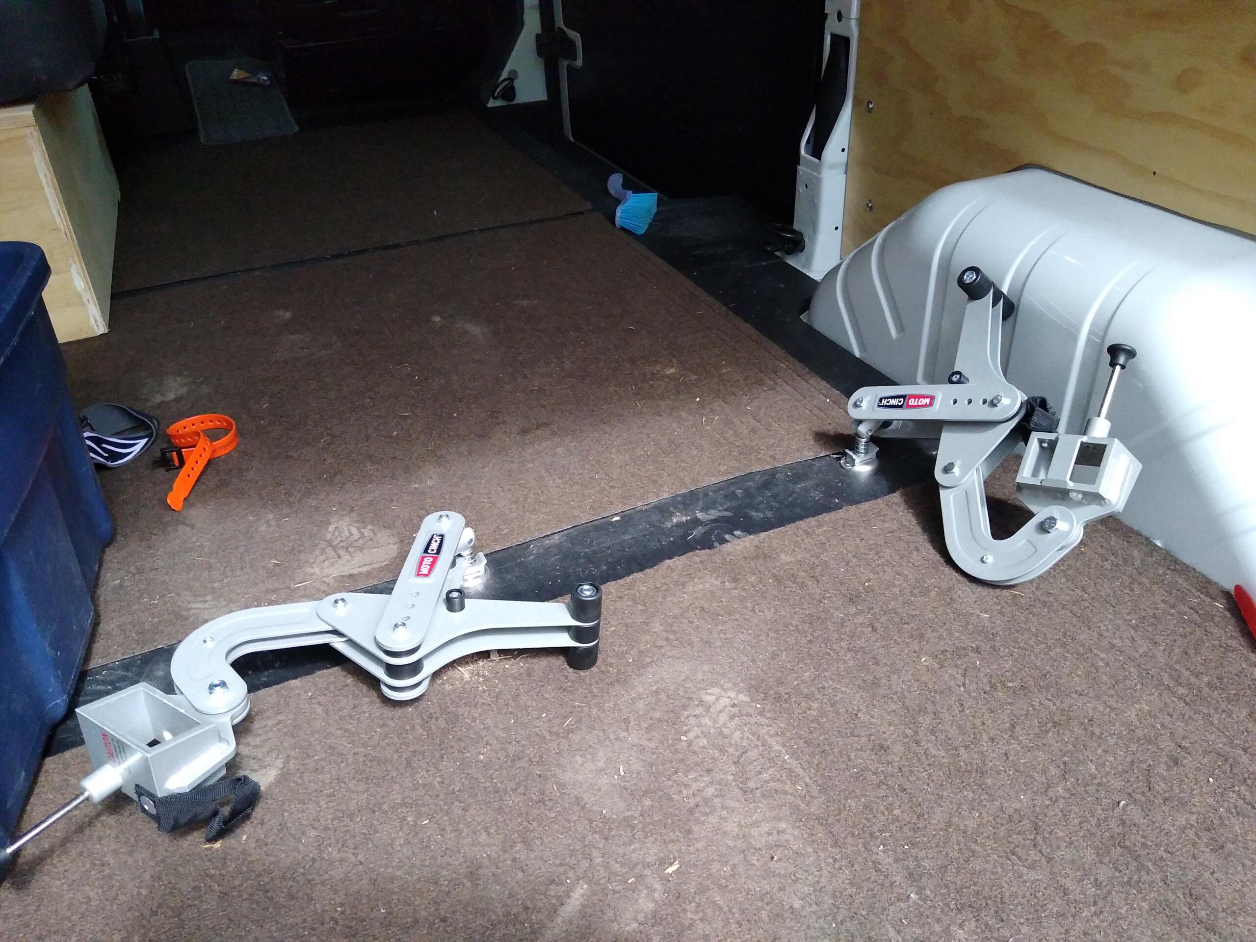 Moto Cinch strapless motorcycle tie down system - foot peg tie downs