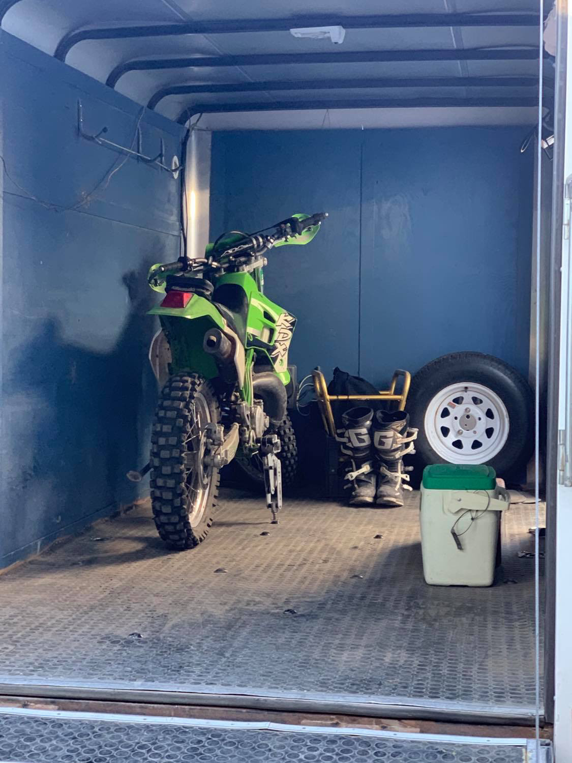 Moto Cinch strapless motorcycle tie down system - foot peg tie downs