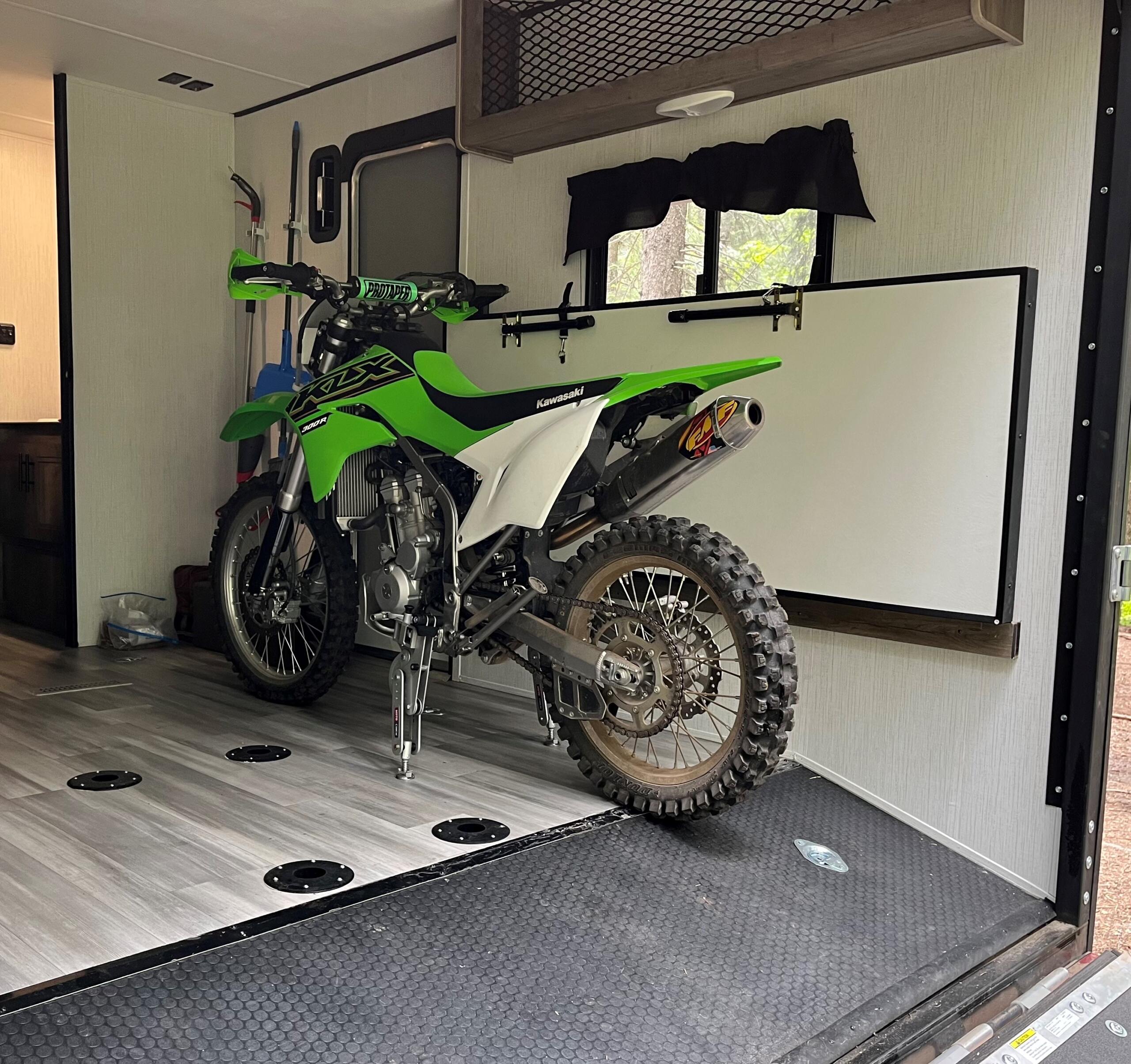 Moto Cinch motorcycle foot peg tie down system