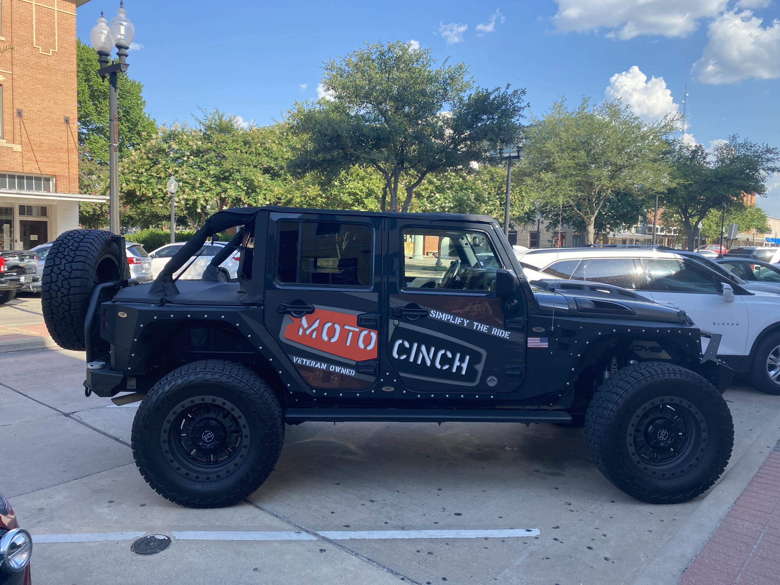 Moto Cinch motorcycle foot peg tie down system