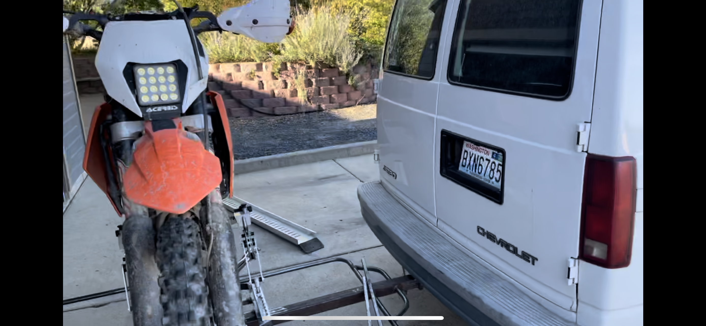 Hitch carrier for 2 motorcycles utilizing Moto Cinch strapless tie downs