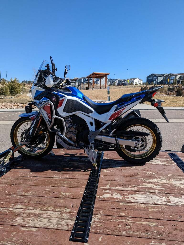 Honda Africa Twin and Moto Cinch foot peg tie down system