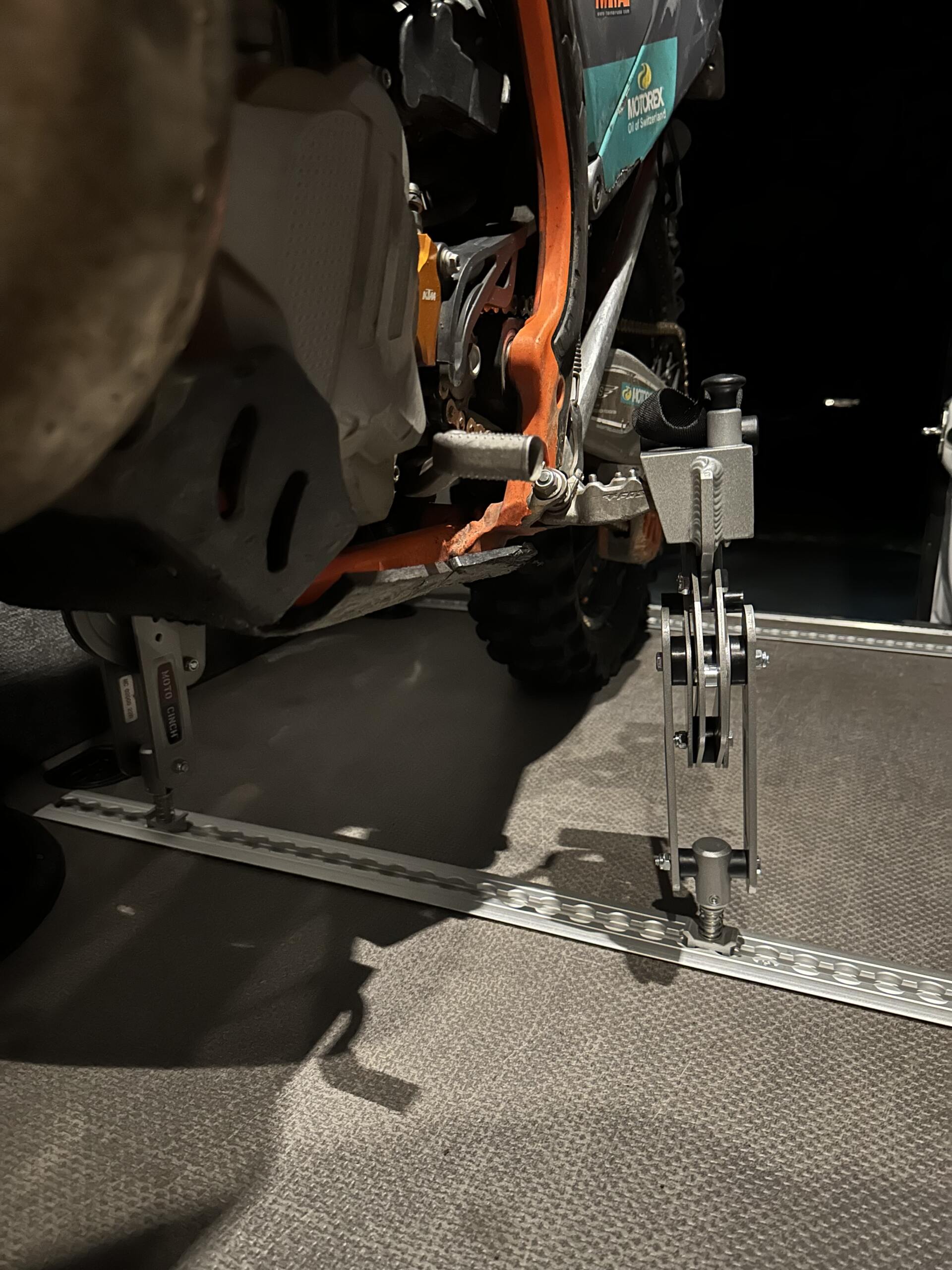 Moto Cinch strapless tie downs for dirt, street, ADV and sport bikes!